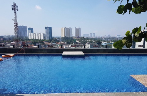 Cikokol Apartment | Cozy Studio Apartment at Tree Park City