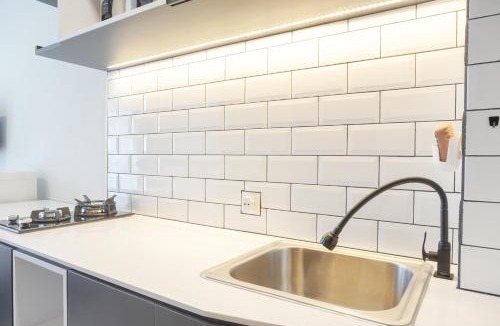 Kayu Putih Apartment | Cozy Studio at Tifolia Apartment By Travelio