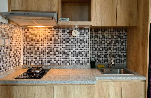 Pondok Aren Apartment | Cozy Studio Emerald Bintaro Icon by alonelyroom