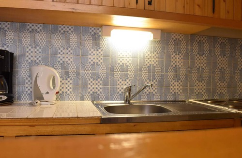 Meribel Apartment | Cozy Studio for 4 in Méribel – Ski Nearby, Fireplace, Modern Amenities