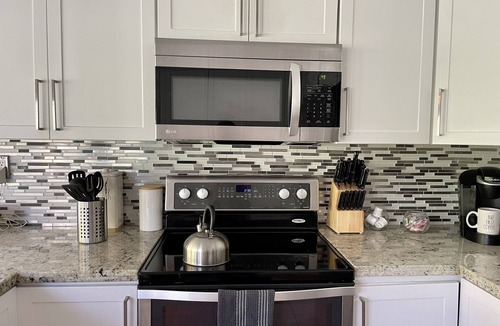 Ludlam House | Cozy Suburban Home with huge backyard and pool! Welcome!