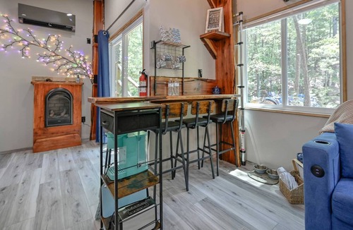 Boles Cabin | Cozy Tiny Cabin with Porch & Fire Pit near Scenic Trails in Western Arkansas