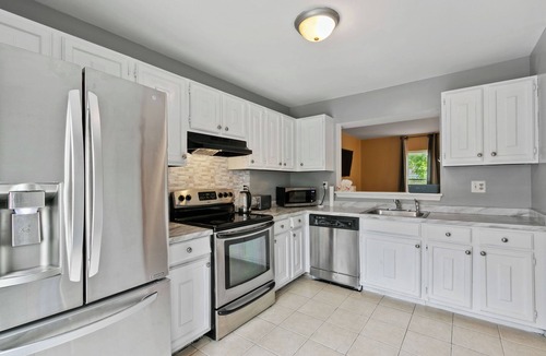 Calverton House | Cozy & Tranquil Getaway: Deck, Yard, Free Parking!