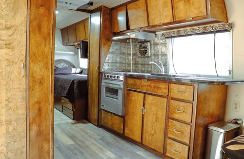 Poteau House | Cozy Vintage Airstream among the pines on World's Highest Hill. Pet-Friendly!