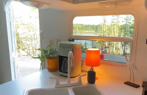 Lepreau House | Cozy waterfront property nestled amongst spruce trees.nPet friendly.