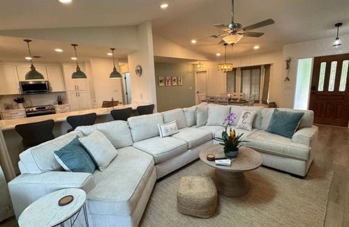 Gulf Cove House | Cozy waterfront retreat with hot tub, deck, and firepit.