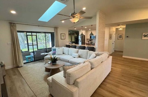 Gulf Cove House | Cozy waterfront retreat with hot tub, deck, and firepit.