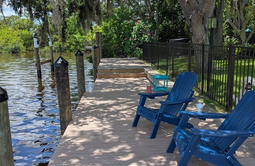 Gulf Cove House | Cozy waterfront retreat with hot tub, deck, and firepit.