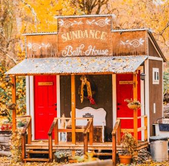 Murphy Other | Cozy Wild West Covered Wagon next to River