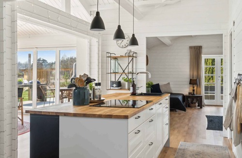 Idestrup House | Cozy wooden cottage with a great terrace