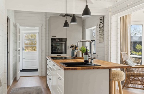 Idestrup House | Cozy wooden cottage with a great terrace