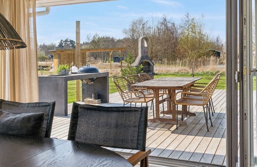 Idestrup House | Cozy wooden cottage with a great terrace