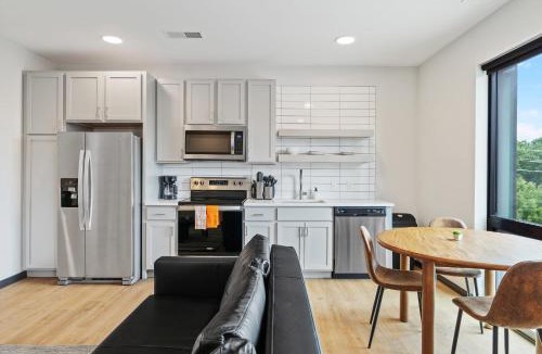 Lockerbie Square Apartment | CozySuites Mass with lounge and roof deck #6