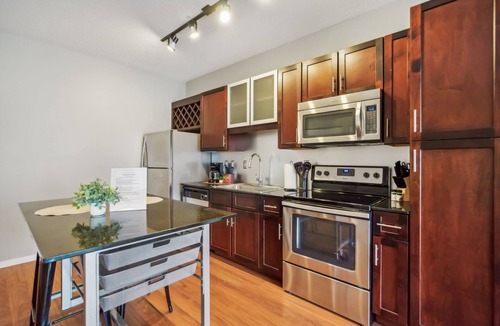 Mill District Apartment | CozySuites Mill District with gym # 10