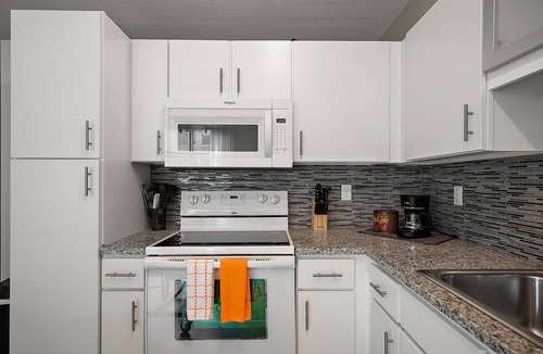 Mill District Apartment | CozySuites Mill District with gym #13