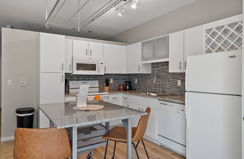 Mill District Apartment | CozySuites Mill District with gym #13