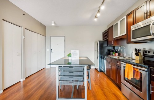 Mill District Apartment | CozySuites Mill District with gym # 09