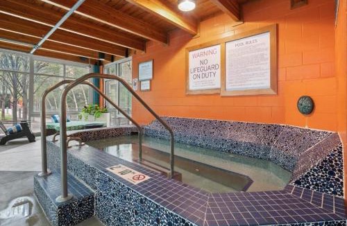 Mill District Apartment | CozySuites Mill District with pool, gym #11