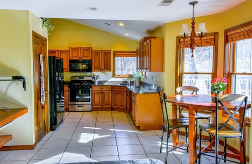 Whittier House | Creek-side home with private hot tub, game room, firepit, deck & mountain view