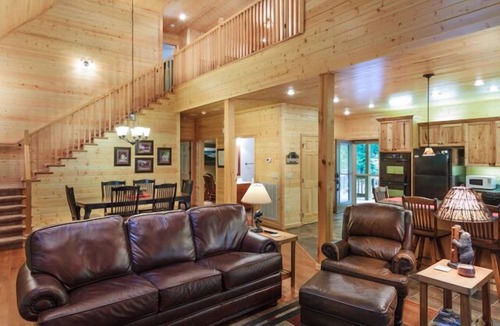 Cosby Cabin | Creekfront cabin with cozy interiors, hot tub & game room.