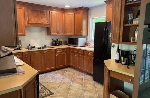 Montoursville House | Creekfront getaway with hot tub and fire pit.