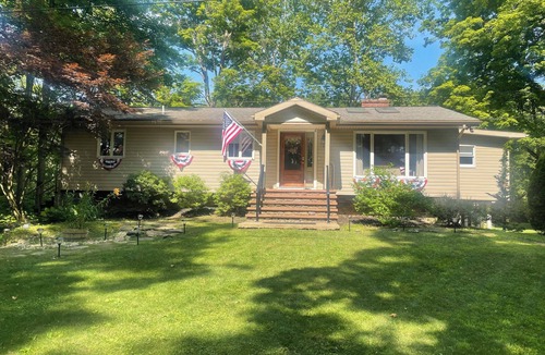 Montoursville House | Creekfront getaway with hot tub and fire pit.