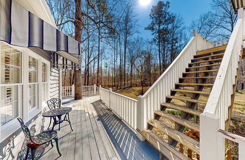 Forsyth House | Creekside home with firepit, yard games, deck, wood stove, & W/D