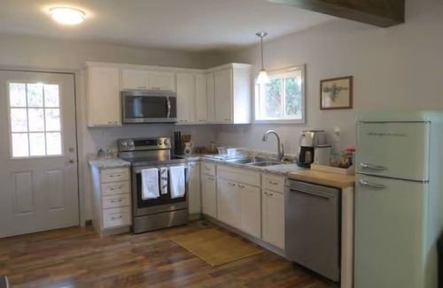 Hartford House | Creekside Mountain Retreat. Waterfall, pond, natural serenity, pet-friendly.