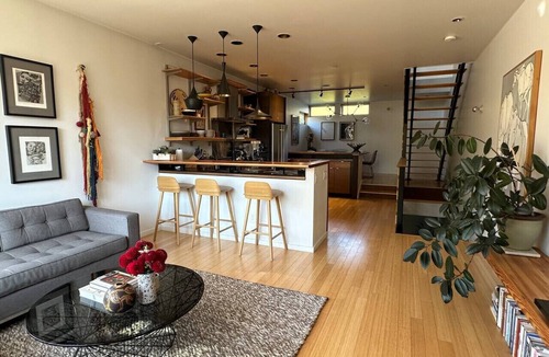 Squire Park Villa | Curated Designer Home with Lush Patio