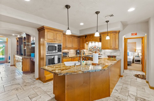 Little Venice House | Custom canal-front home with private pool, palapa hut, & outdoor kitchen