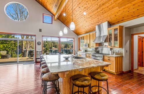 Sedro-Woolley House | Custom lakefront gem with private dock, hot tub, firepit, & chef's kitchen
