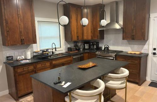 Rochester Villa | Custom Luxury Rambler in Highland Hills