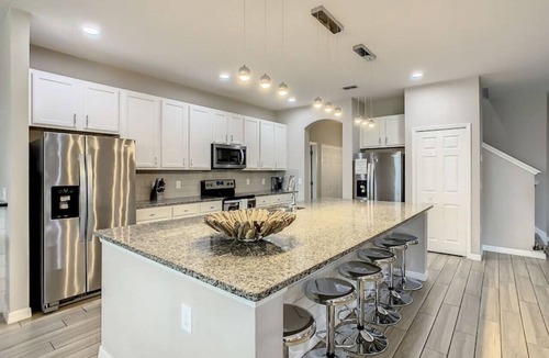 Loughman House | Custom Themed Home sleeps 32 -near parks with private pool, theater, game room!