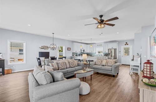 Captain's Cove House | Custom waterfront home with elevator by Seaside Vacations & Sales