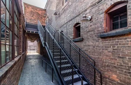 The Flats Apartment | Cute 1Bed Loft at The Foundry - Steps to Riverside