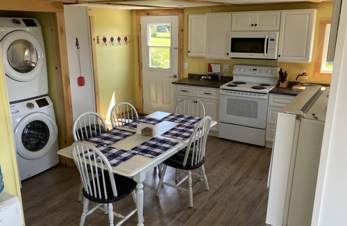 Victoria Cottage | Cute cottage with water view. Steps to a red sand beach on the South Shore.