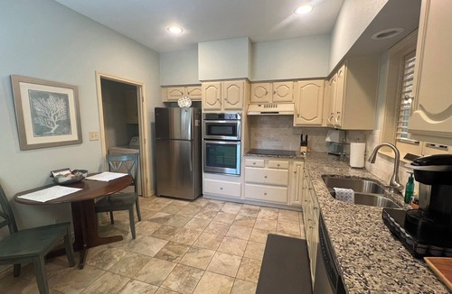 Garland House | Cute & cozy 2bd/2bth home, heated spa, close to DART station, convenient!