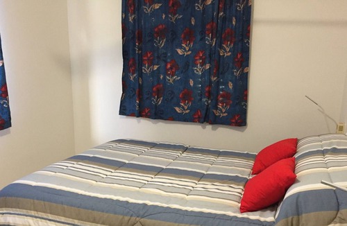 Tin Can Bay House | Cute Little House with air conditioning