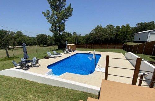 Sulphur House | Cute newly remodeled home with an in ground pool and huge back yard.