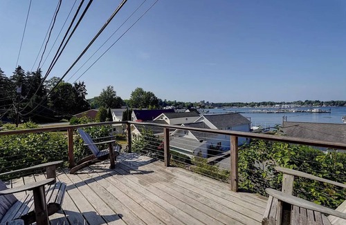 Sodus Point Cottage | Cute red cottage on the hillside overlooking Sodus Bay. Direct water access