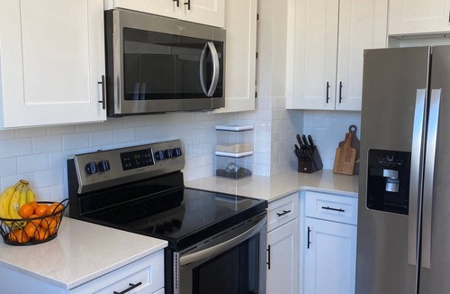 Tooele House | Cute remodeled 2 bedroom with office, long drive way, and 75” TV.