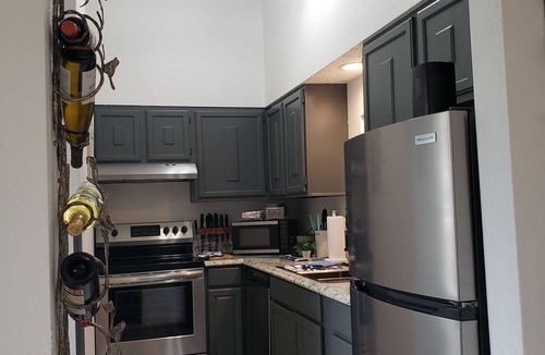 Joplin Condo | Dazzling, Cozy Retreat in convenient and secure apartment complex location.