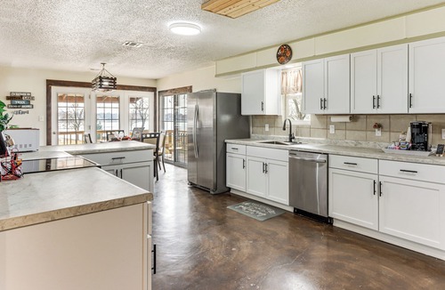 Grove House | Deck & Yard: Wolf Creek Waterfront Home in Grove!