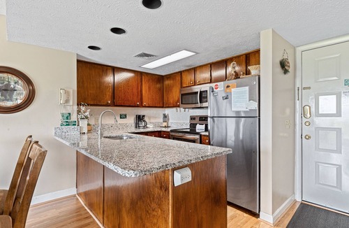 Gatlinburg Condo | Deer Ridge E108 | Balcony, Resort Pools, Tennis + Picnic Area