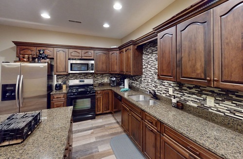 Edray House | Delightful 6BR Townhome with Private Hot Tub by RedAwning
