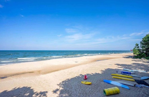 Macatawa House | Delightful Private Wooded Setting Stunning Harbor Views, Private Beach Access, Tennis