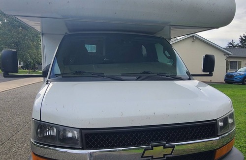 Emmaus House | Delightful RV rental with AC and kitchenette