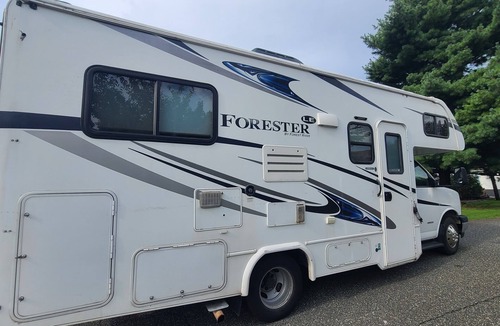 Emmaus House | Delightful RV rental with AC and kitchenette