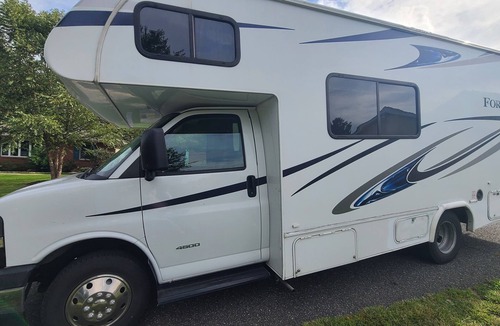 Emmaus House | Delightful RV rental with AC and kitchenette