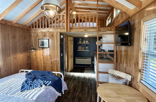 Bolivia RV Rental | Deluxe Loft Cabin - Upscale Cozy Loft Cabin